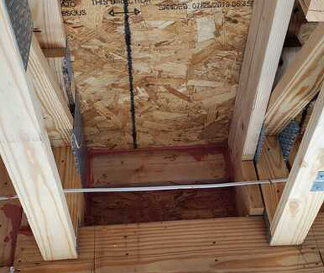 Energy star air seal with fire rated foam and red fire caulk.