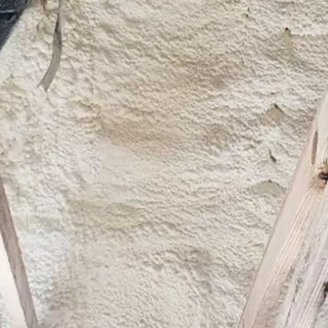 Close up of closed cell spray foam on a ceiling