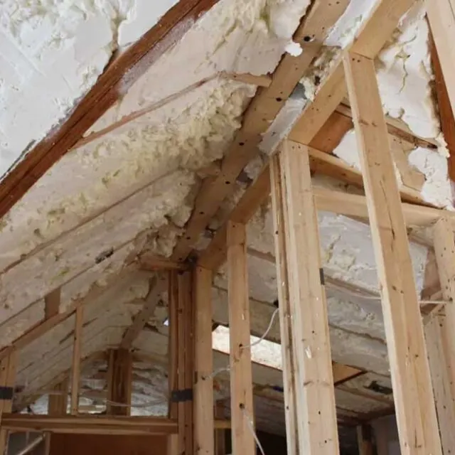 Open cell spray foam in a ceiling with a sharp slope.