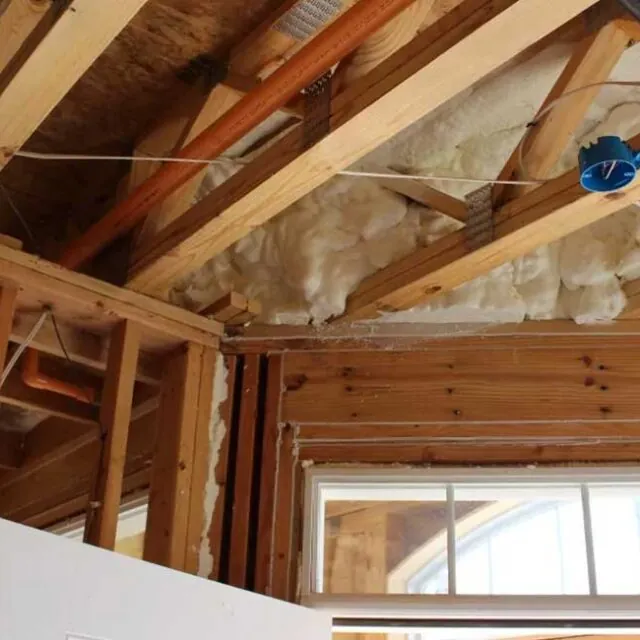 Spray foam in a new construction home ceiling.