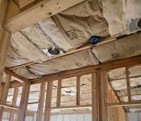 Southland Insulators open-cell spray foam in exterior wall cavities with R-49 batt insulation in the ceiling of a home under construction in Manassas, VA.