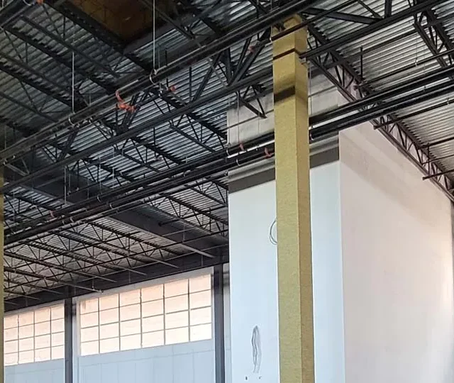 Albi cladding fireproofing on steel columns of a data center. Albi cladding fireproofing on steel columns of a data center.